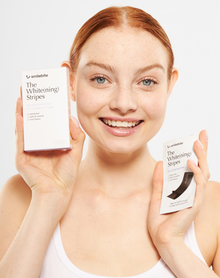 The White(ning) Stripes Комплект от 28 ленти за избелване на зъби Smilebite.