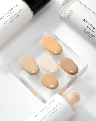 Озаряващ и хидратиращ фон дьо тен с хиалуронова киселина Nutridome Illuminating Foundation